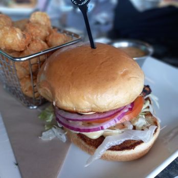 Topgolf - Grilled chicken sandwich with tater tots..delicious!! - Golf Near Me - Germantown, Maryland Topgolf - Grilled chicken sandwich with tater tots..delicious!! - Golf Near Me - Germantown, Maryland