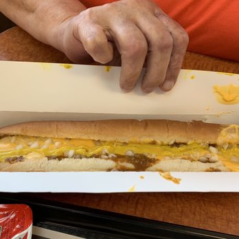A&W Restaurant - Footlong coney dog with onions mustard and cheese. - Burgers Near Me - Monroe, Michigan