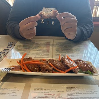 Long Beach Cafe Restaurant - a man eating a meal - Thai Near Me - Lakewood, Washington
