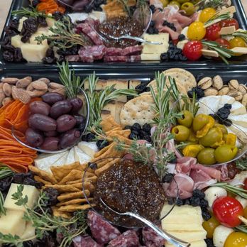Orders UP - Artisan charcuterie board with premium cheeses, cured meats, nuts, olives, fruit, and seasonal garnishes. - Food Delivery Services Near Me - Bozeman, Montana