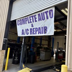 Edgewood Service and Tires - Signage hanging from one of the bays.