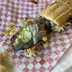 Bradley’s Cajun Quick Stop & Deli - 9 inch Roast beef poboy with only 2 slices of beef.