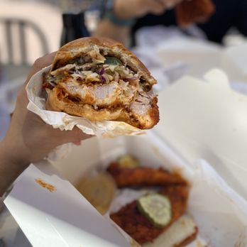 Cluck Kitchen - Spicy chicken sandwich and tenders, traditional pickles and toast included to soak up the drippings. - Chicken Shop Near Me - Irvine, California