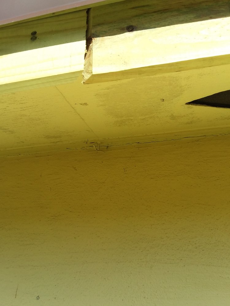 Slide of Father and Son Roofing