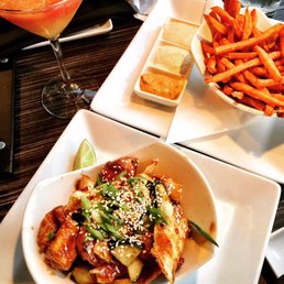 Asian chicken bites, sweet potato fries, and their peach Bellini! Asian chicken bites, sweet potato fries, and their peach Bellini!