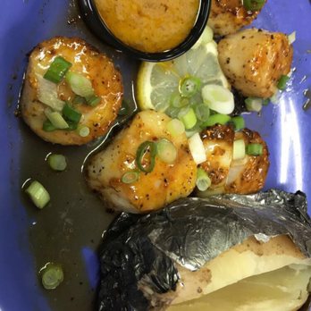 Wynndale Steakhouse & Restaurant - Scallops & garlic butter with baked potato - Steakhouses Near Me - Terry, Mississippi Wynndale Steakhouse & Restaurant - Scallops & garlic butter with baked potato - Steakhouses Near Me - Terry, Mississippi