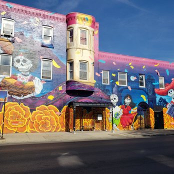 Nuevo Leon Restaurant - a colorful mural on the side of a building - Mexican Near Me - Chicago, Illinois Nuevo Leon Restaurant - a colorful mural on the side of a building - Mexican Near Me - Chicago, Illinois
