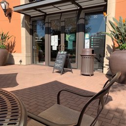 the entrance to a coffee shop