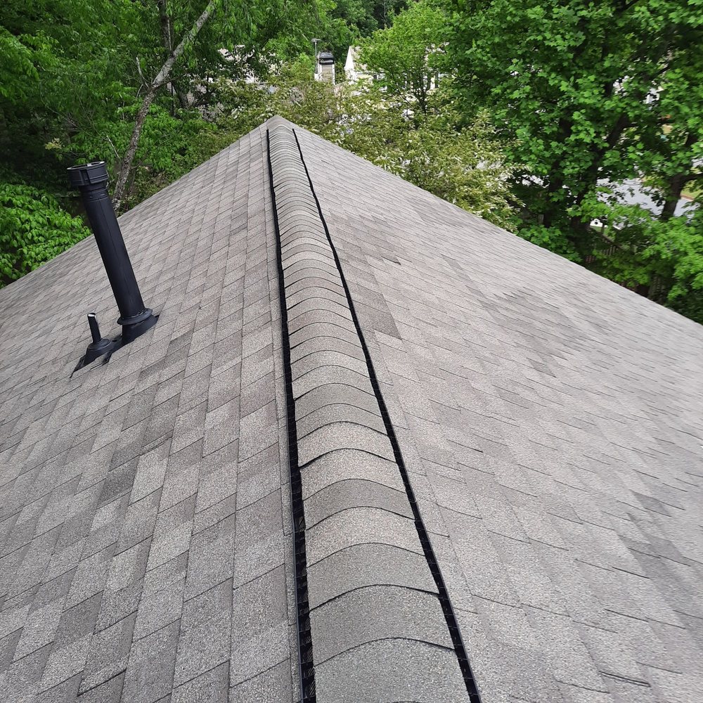 Slide of Arbra Roofing