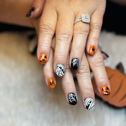 Q Spa Nails - Spooky season is here! Get your Halloween nails on point at Q Spa Nails #HalloweenNails #SpookyVibes #QSpaNails