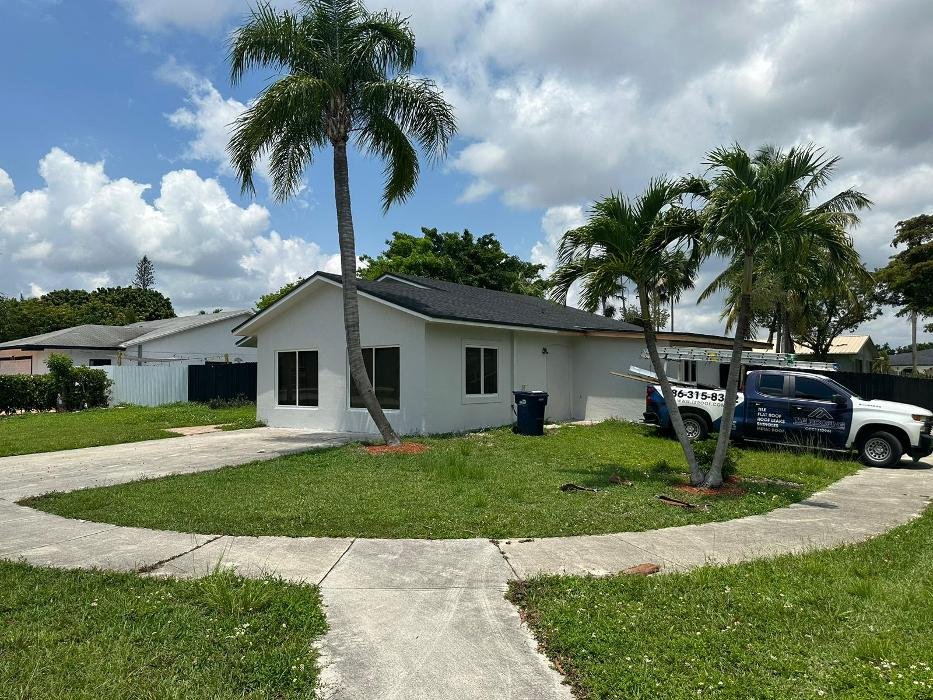 Slide of T & E Roofing