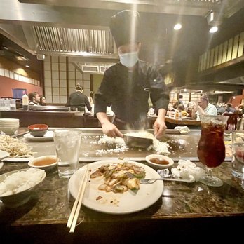 Japanese Palace - a chef preparing food in a restaurant - Japanese Near Me - Fort Worth, Texas Japanese Palace - a chef preparing food in a restaurant - Japanese Near Me - Fort Worth, Texas