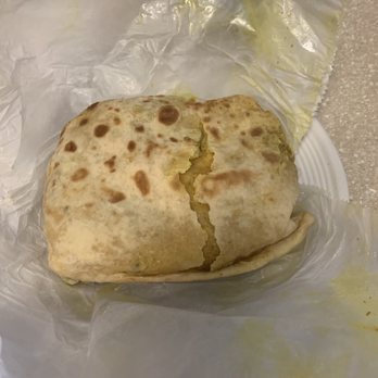 Teddy's Roti Shop - #12 bone out chicken roti - Trinidadian Near Me - Washington, DC, District of Columbia Teddy's Roti Shop - #12 bone out chicken roti - Trinidadian Near Me - Washington, DC, District of Columbia