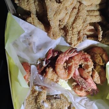 Family Fish Market - The fish with cornmeal falling all off of it!!! - Seafood Markets Near Me - Carson, California