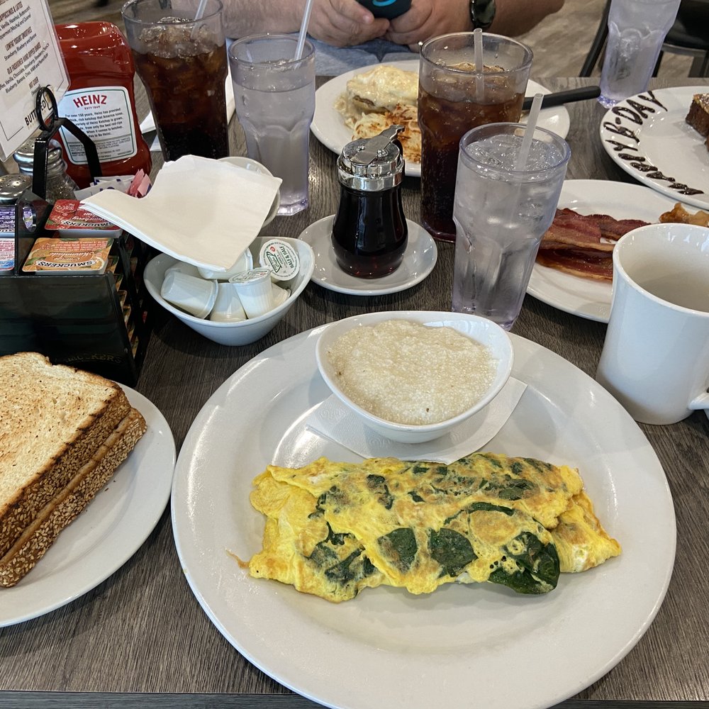 Burnt Toast - Spinach and Gruyère omelette with grits and Greek toast - Breakfast & Brunch Near Me - Algonquin, Illinois Burnt Toast - Spinach and Gruyère omelette with grits and Greek toast - Breakfast & Brunch Near Me - Algonquin, Illinois