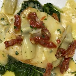 Panevino Ristorante Naples - Chilean Sea Bas
In a bed of spinach
With artichoke and sundry tomato
White wine lemon sauce