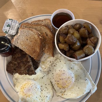 FarmHand Kchn and Coffee: Sandwich Shoppe - Two eggs over medium with sausage patty and potatoes - Breakfast & Brunch Near Me - St. Augustine, Florida FarmHand Kchn and Coffee: Sandwich Shoppe - Two eggs over medium with sausage patty and potatoes - Breakfast & Brunch Near Me - St. Augustine, Florida