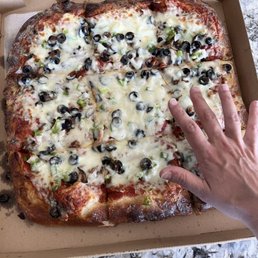 Large deep dish supreme, can't remember the name exactly Large deep dish supreme, can't remember the name exactly