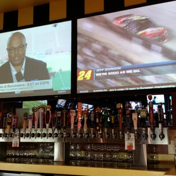 Buffalo Wild Wings - a man on a television screen - American Near Me - Owensboro, Kentucky
