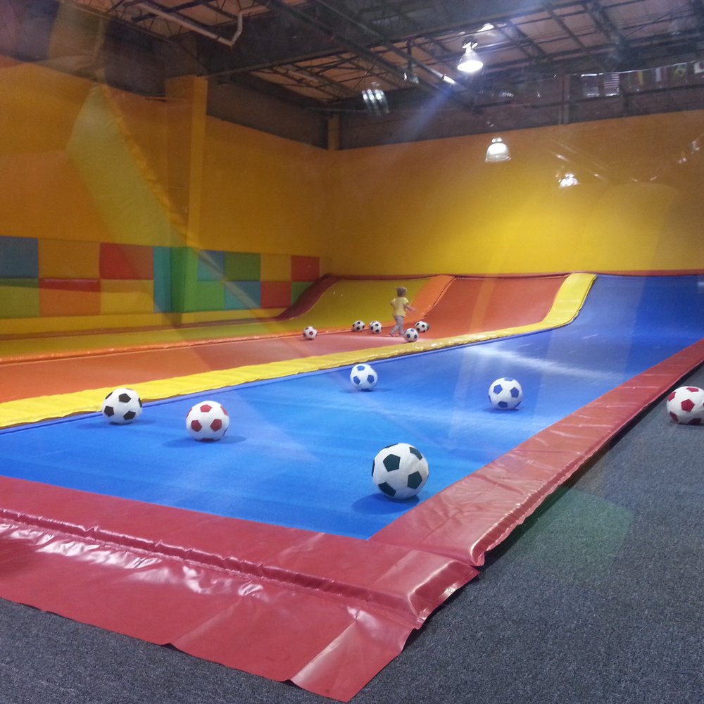 Jump Party USA - Kids trampoline area with basket ball net mounted on the wall - Trampoline Parks Near Me - Kyle, Texas Jump Party USA - Kids trampoline area with basket ball net mounted on the wall - Trampoline Parks Near Me - Kyle, Texas