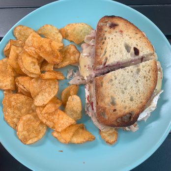 Meraki Café - Turkey Brie Sandwich on sourdough and chips. My son's girlfriend thoroughly enjoyed this! - Coffee & Tea Near Me - San Diego, California Meraki Café - Turkey Brie Sandwich on sourdough and chips. My son's girlfriend thoroughly enjoyed this! - Coffee & Tea Near Me - San Diego, California