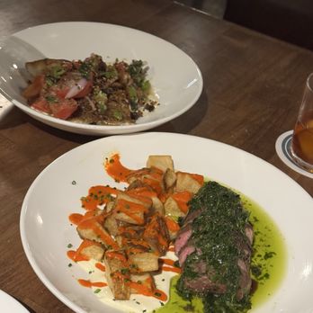 Costera - Gulf Fish w/ heirloom tomatoes (top) / Grilled Teres Major Steak - Spanish Near Me - New Orleans, Louisiana