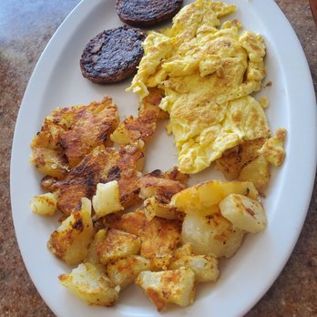 Toasted Cafe - 2 Eggs Any Style with Sausage and hash browns - New American Near Me - Margate, Florida
