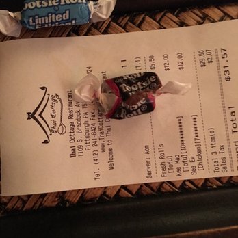 Thai Cottage - Here is your bill paying customer would you like a piece of complimentary candy? - Thai Near Me - Pittsburgh, Pennsylvania