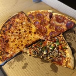 Nick-N-Willy's Pizza - 3 pizzas for the family, love it when the pepperoni is baked on the top - and the crust was perfect!