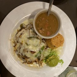 Mi Cocula Mexican Grill - Chicken and chorizo topped with bell peppers, Monterrey cheese, rice, beans