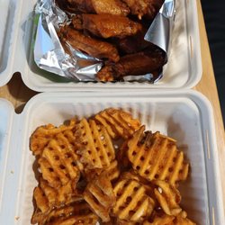 LaVia Pizzeria - Waffle fries (that we ate like half of on the way home) and extra hot wings