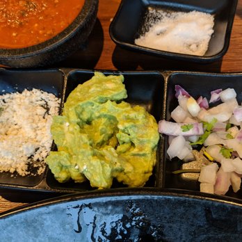 SOL Mexican Cocina - Fixins for short ribs barbacoa - Bars Near Me - Denver, Colorado SOL Mexican Cocina - Fixins for short ribs barbacoa - Bars Near Me - Denver, Colorado