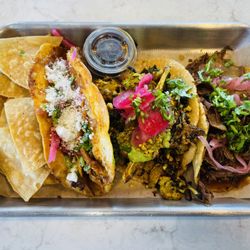 Saucy Chick Indi-Mex Eatery - 3-Taco Plate: Pibil Rotisserie Chicken, Charred Haldi Cauliflower and Birria on Homemade Corn Tortillas.