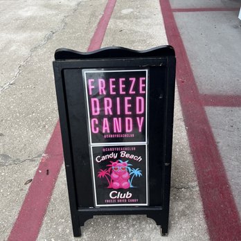 Candy Beach Club - a sign on the sidewalk - Candy Stores Near Me - Hollywood, Florida