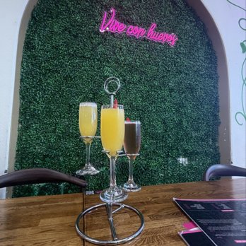 Madres Brunch - Mimosa flight (orange, cranberry, pineapple)  All the flavors were good but the cranberry flavor was really good. - Breakfast & Brunch Near Me - Whittier, California