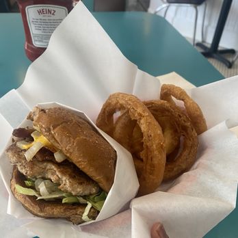 Hunky's Hamburgers - Cheese Ground Turkey Cheeseburgerwith homemade onion rings - Burgers Near Me - Dallas, Texas