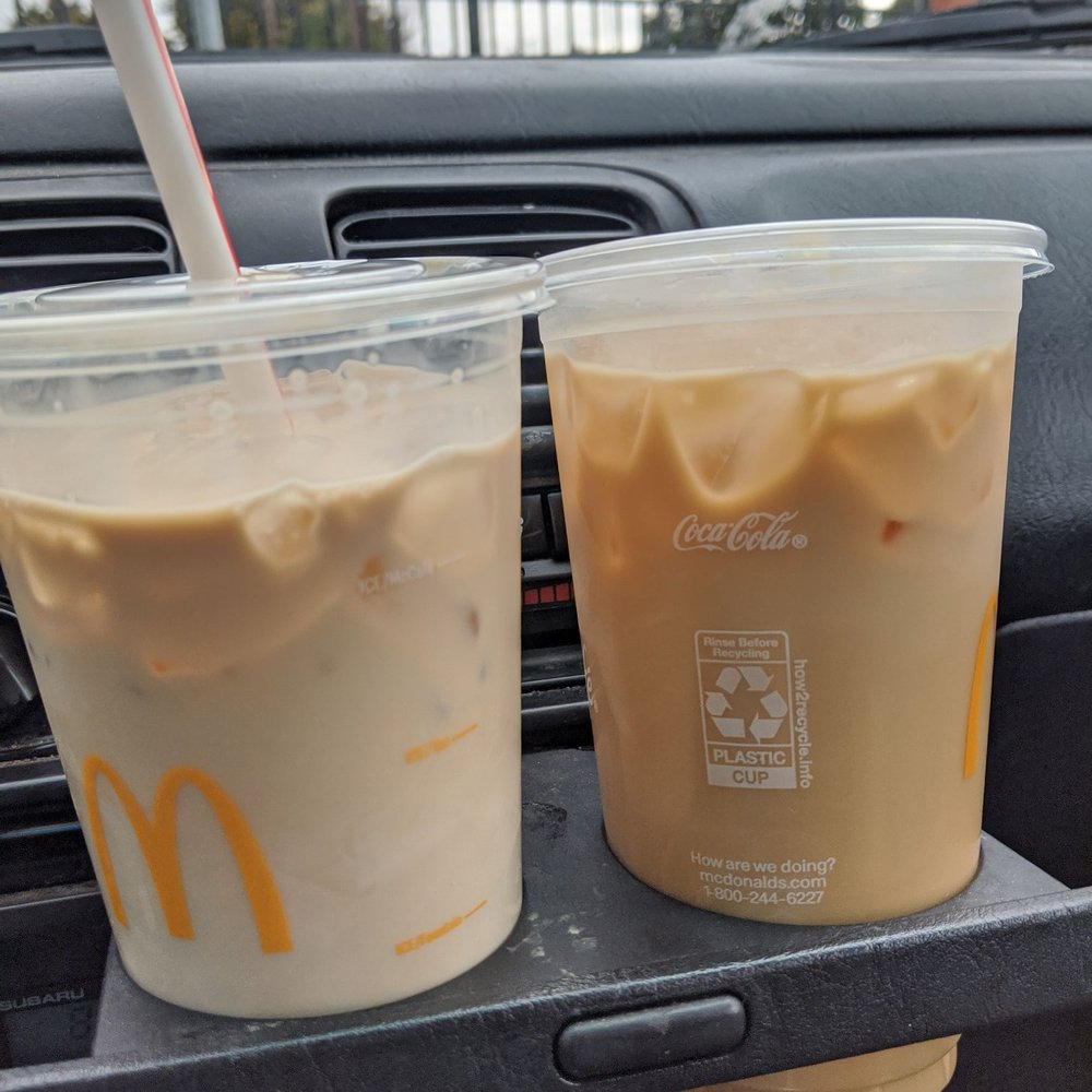 McDonald's - Left is coffee unsweetened after incorrectly giving me a sweet ice coffee, note that the new coffee is lighter color mostly being milk - Burgers Near Me - Arcata, California McDonald's - Left is coffee unsweetened after incorrectly giving me a sweet ice coffee, note that the new coffee is lighter color mostly being milk - Burgers Near Me - Arcata, California