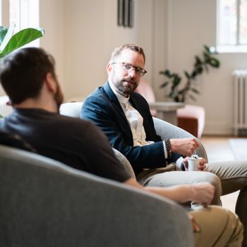 Trinity Church Seattle - Two men chatting in the lobby. - Churches Near Me - Seattle, Washington Trinity Church Seattle - Two men chatting in the lobby. - Churches Near Me - Seattle, Washington