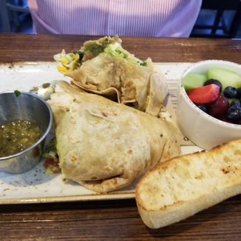First Watch - Breakfast burrito with egg whites, cheese, avocado, black beans, lettuce, salsa verde. - Breakfast & Brunch Near Me - Orlando, Florida First Watch - Breakfast burrito with egg whites, cheese, avocado, black beans, lettuce, salsa verde. - Breakfast & Brunch Near Me - Orlando, Florida