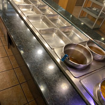 Happy China Buffet - a buffet with a variety of food items - Chinese Near Me - Bangor, Maine