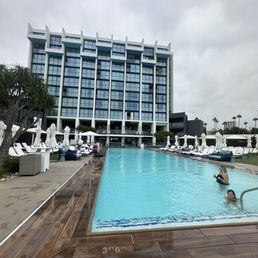 a man in the middle of the pool a man in the middle of the pool