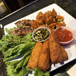 Mulligans - Sampler- potstickers, mozzarella sticks, banger bites