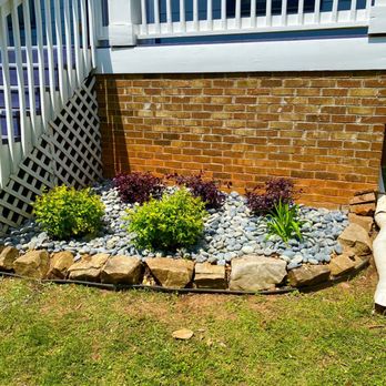 Flowerbed Creations - Purple loropetalum  Crimson fire Yellow kaleidoscope abelia  Blue day lillys - Landscaping Near Me