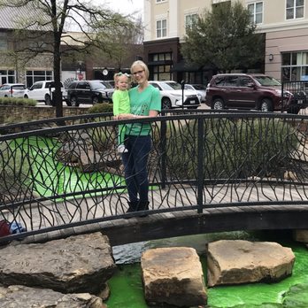 Watters Creek - Lovely green water among St. Patrick's celebrations . - Shopping Centers Near Me - Allen, Texas