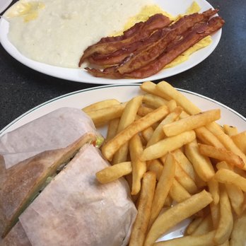 Jimbo's Hamburger Palace - My bud had scrambled eggs with bacon and grits. I had chicken breast sandwich on a roll with tom, let and mayo - Burgers Near Me - New York, New York Jimbo's Hamburger Palace - My bud had scrambled eggs with bacon and grits. I had chicken breast sandwich on a roll with tom, let and mayo - Burgers Near Me - New York, New York