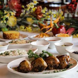 Avenida Brazil Churrascaria Steakhouse - Brazilian style grilled chicken legs marinated in cognac, beer and served tableside in the Woodlands, TX.