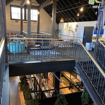 Outer Range Brewing - Sitting upstairs looking down toward the brewery tap set-up - Breweries Near Me - Frisco, Colorado Outer Range Brewing - Sitting upstairs looking down toward the brewery tap set-up - Breweries Near Me - Frisco, Colorado