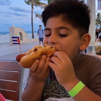Marco's Deli - Special hot dog (bacon wrapped), did not last long on my son's plate. - Delis Near Me - Hollywood, Florida Marco's Deli - Special hot dog (bacon wrapped), did not last long on my son's plate. - Delis Near Me - Hollywood, Florida