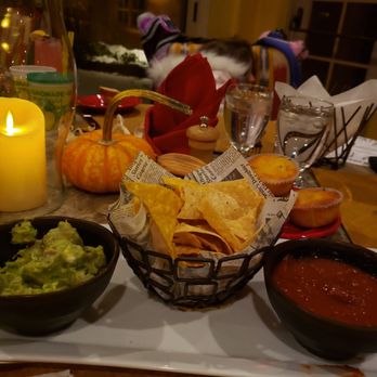 Amaya - Chips and salsa appetizer with guacamole.  Salsa is sweet and smokey - New American Near Me - Santa Fe, New Mexico