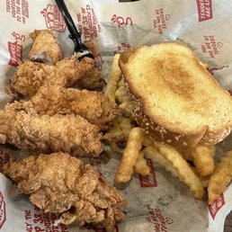 5 piece tender combo, with fries and toast. (Out of picture) Coleslaw on the side with a ice cold coke and their magoo sauce. 5 piece tender combo, with fries and toast. (Out of picture) Coleslaw on the side with a ice cold coke and their magoo sauce.